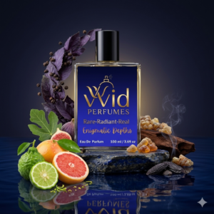 A bottle of Versace Dylan Blue, surrounded by elegant dark tones, symbolizing its bold, woody, and aromatic fragrance.